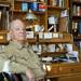 World War II veteran Glenn Dickerson sits at his desk on Monday. Dickerson is being honored with at the Knight of the Legion of Honor award. Daniel Brenner I AnnArbor.com